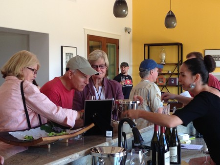 Nessia with tasting room visitors 
